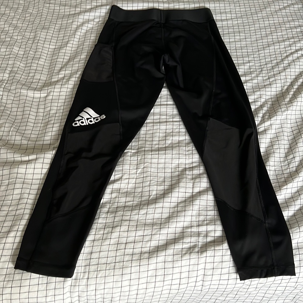 Black Addidas Dry Fit. Ankle length.side pocket mesh breathable material